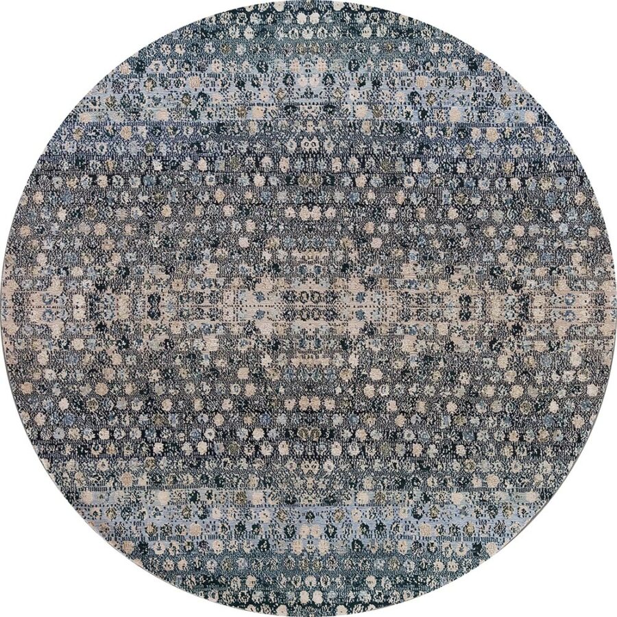 Runder Teppich mit dichtem Muster in Blau- und Beigetönen, der einen abgenutzten Vintage-Look aufweist.