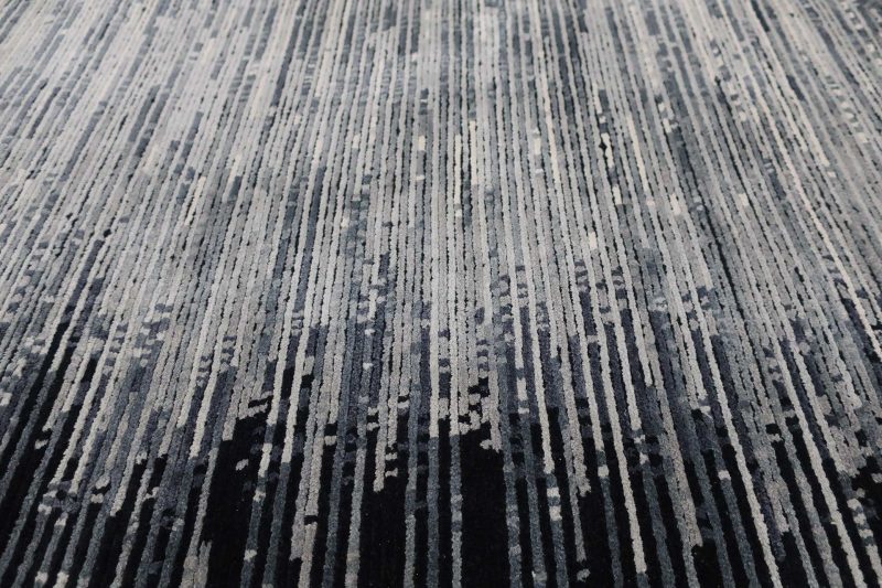 Nahaufnahme eines Teppichs mit gestreiftem Muster.