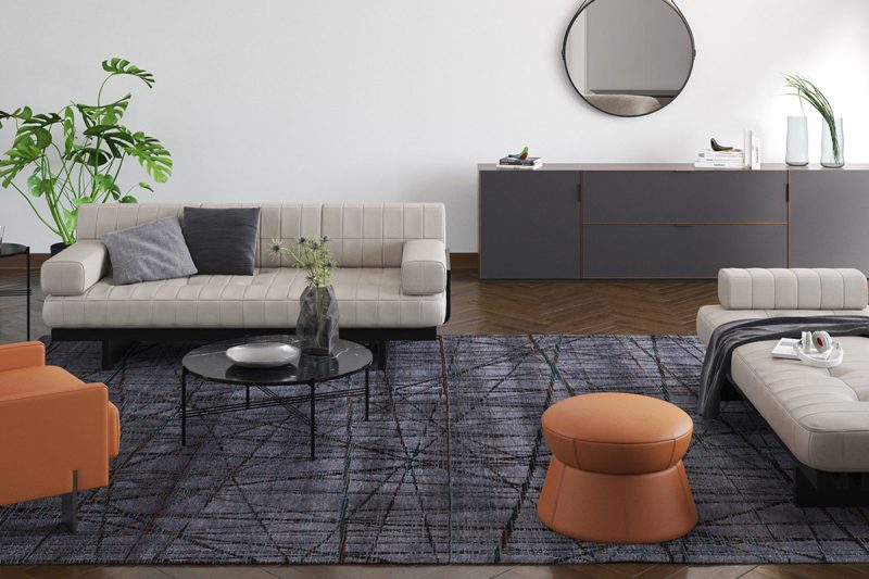 Modern gestaltetes Wohnzimmer mit Herringbone-Parkettboden, einer hellen Ledercouch und Sesseln, einem schwarzen Beistelltisch, einem großen runden Spiegel an der Wand, einer bodenlangen Zimmerpflanze und minimalistischen Dekorationselementen.